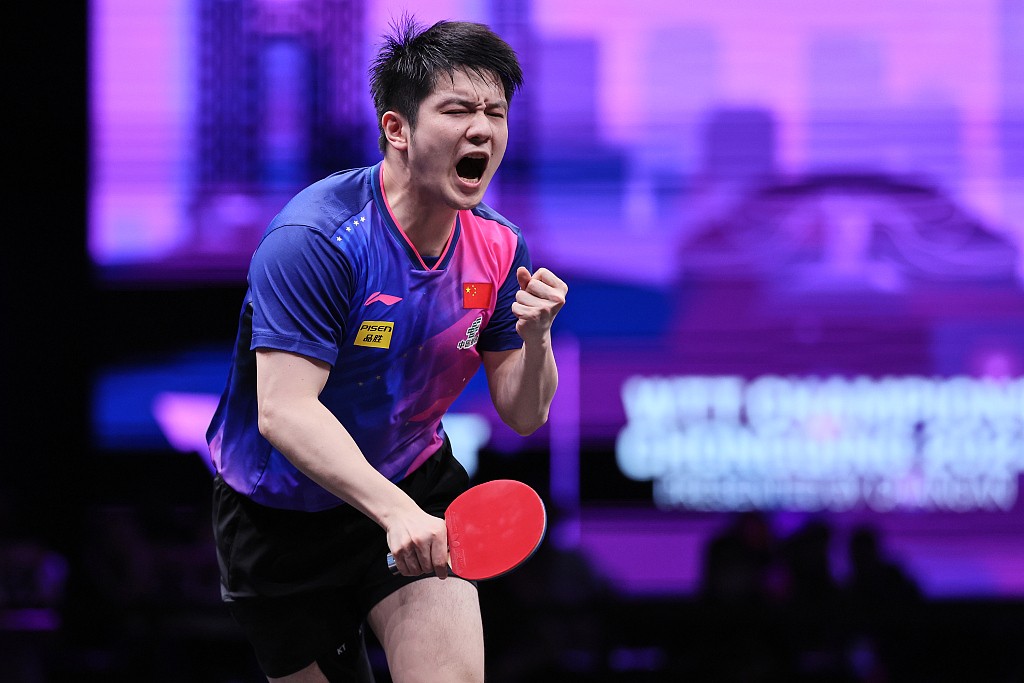Fan Zhendong reacts after scoring a point in his men's singles final against Wang Chuqin of China at the World Table Tennis Chongqing Champions in Chongqing, June 3, 2024. /CFP