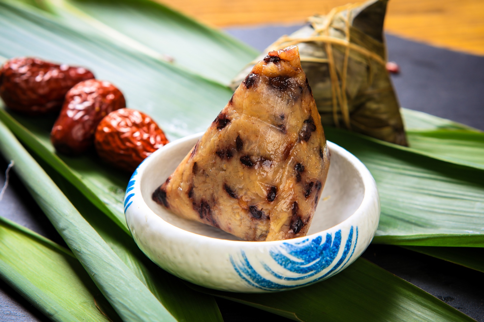 Zongzi, glutinous rice dumplings, are a signature dish of the Duanwu Festival. /IC