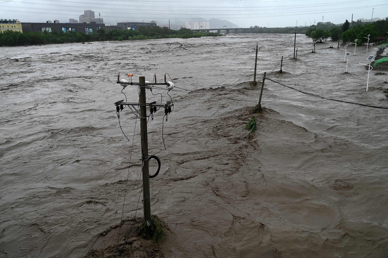 The overflooded Yongding River after heavy rains in Mentougou District in Beijing, July 31, 2023. /CFP