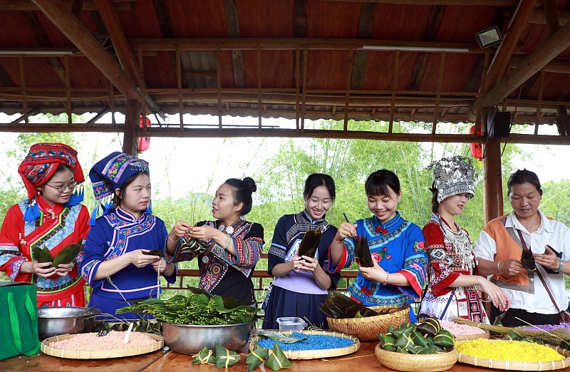 Local women prepare zongzi for the Dragon Boat Festival in Rong'an County, Liuzhou City, Guangxi Zhuang Autonomous Region, June 4, 2024. /CFP