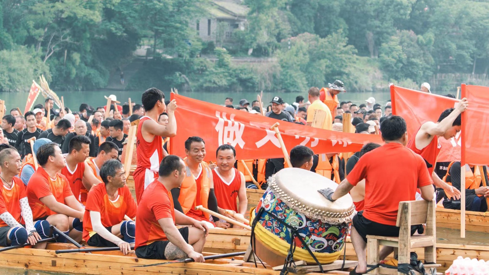 Enthusiastic rowers are captured at a dragon boat parade in Tongren City, Guizhou Province on June 1, 2024. /Photo provided to CGTN