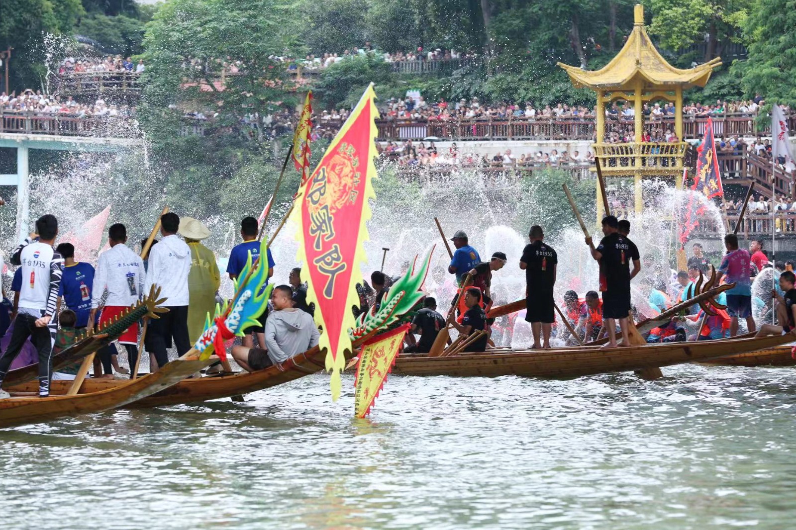 People participate in a dragon boat parade in Tongren City, Guizhou Province on June 1, 2024. /Photo provided to CGTN