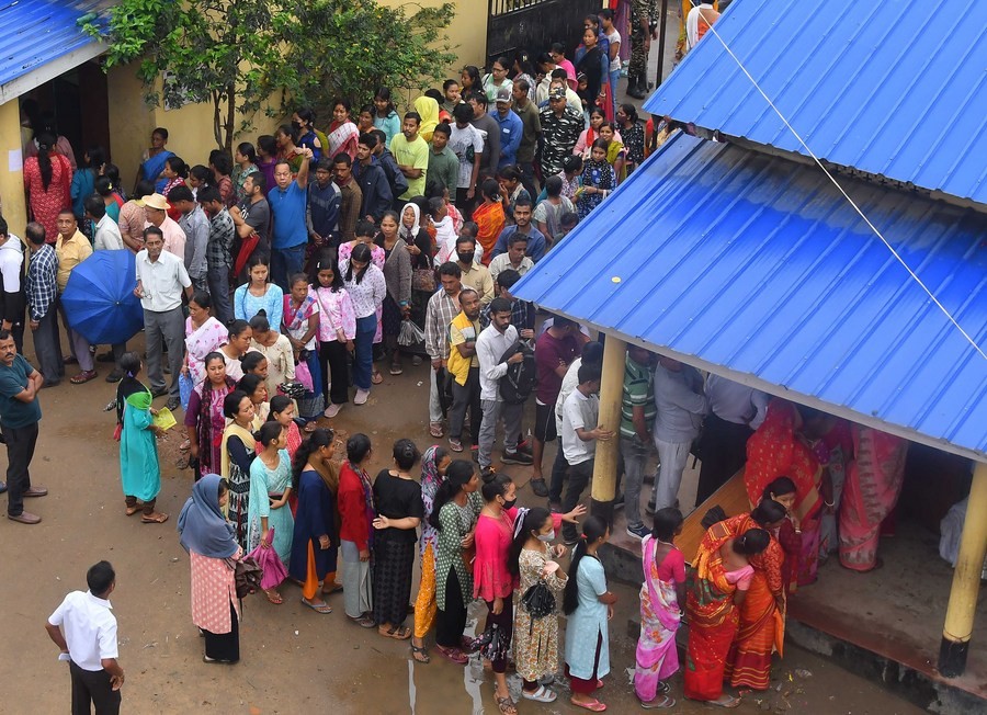 People queue to cast their votes at a polling station during the third phase of India's general elections in Guwahati, Assam, India, May 7, 2024. /Xinhua