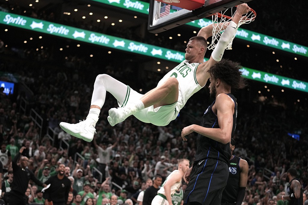 Kristaps Porzingis (C) of the Boston Celtics dunks in Game 1 of the NBA Finals against the Dallas Mavericks at TD Garden in Boston, Massachusetts, June 6, 2024. /CFP