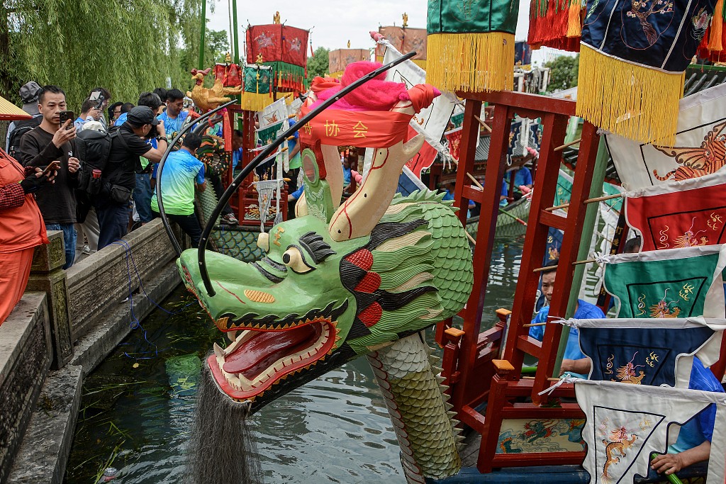 Heads of dragon boats are displayed for veneration in Hangzhou, Zhejiang Province on June 2, 2024. /CFP