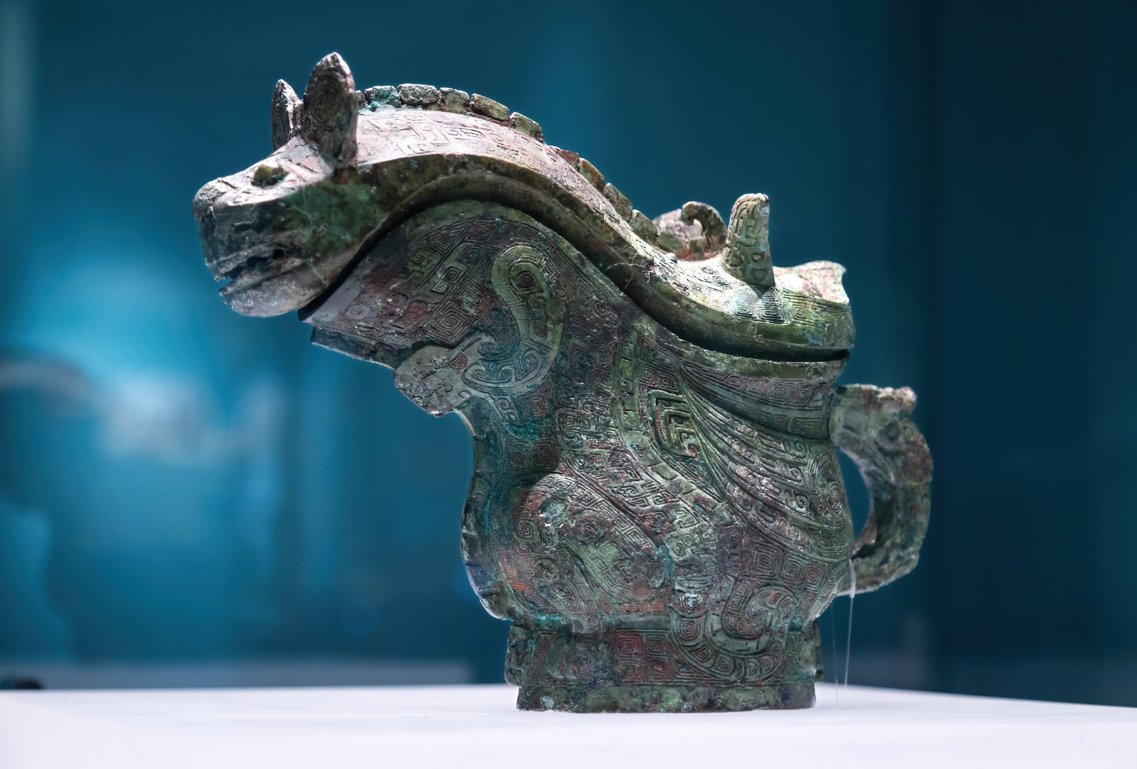 A bronze vessel with dragon decorations is displayed at an exhibition held in Chinese Archaeological Museum, Beijing, China, May 30, 2024. /CFP