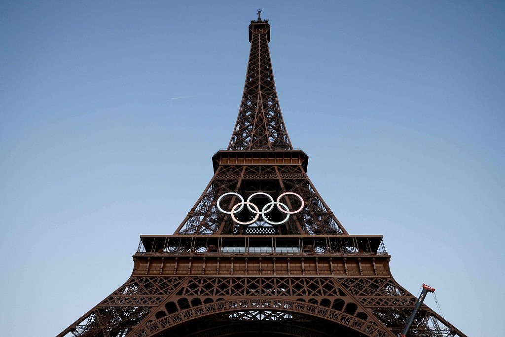 The Olympic logo is displayed on the Eiffel Tower in Paris, France. /CFP