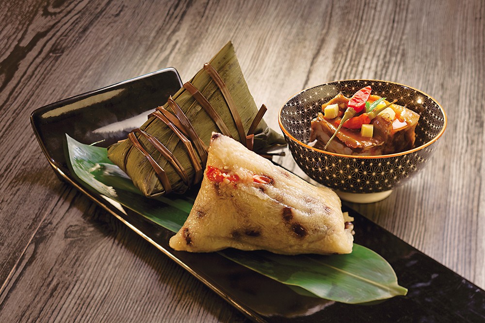 Spicy zongzi with pickled pepper are popular in Sichuan Province. /VCG