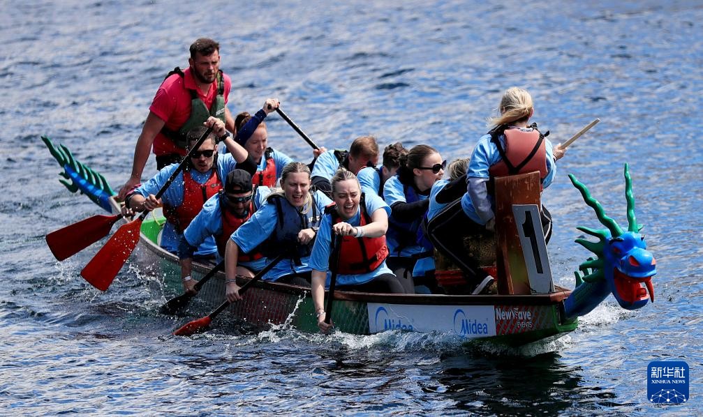 A race at the 10th edition of the UK Chinese Dragon Boat Festival in Salford, Greater Manchester, Britain, June 8, 2024. /Xinhua