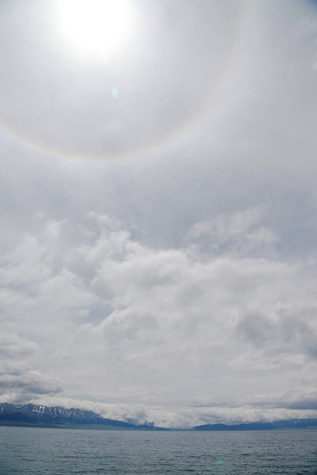 A solar halo is observed over Sayram Lake in Xinjiang. /CGTN