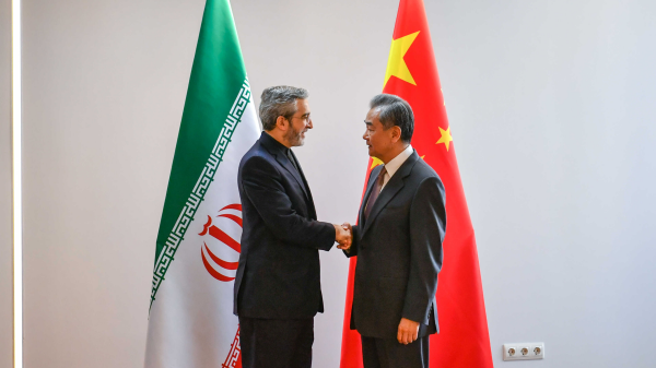 Chinese Foreign Minister Wang Yi (R) shakes hands with Iranian Acting Foreign Minister Ali Bagheri Kani in Nizhny Novgorod, Russia, June 6, 2024. /Chinese Foreign Ministry