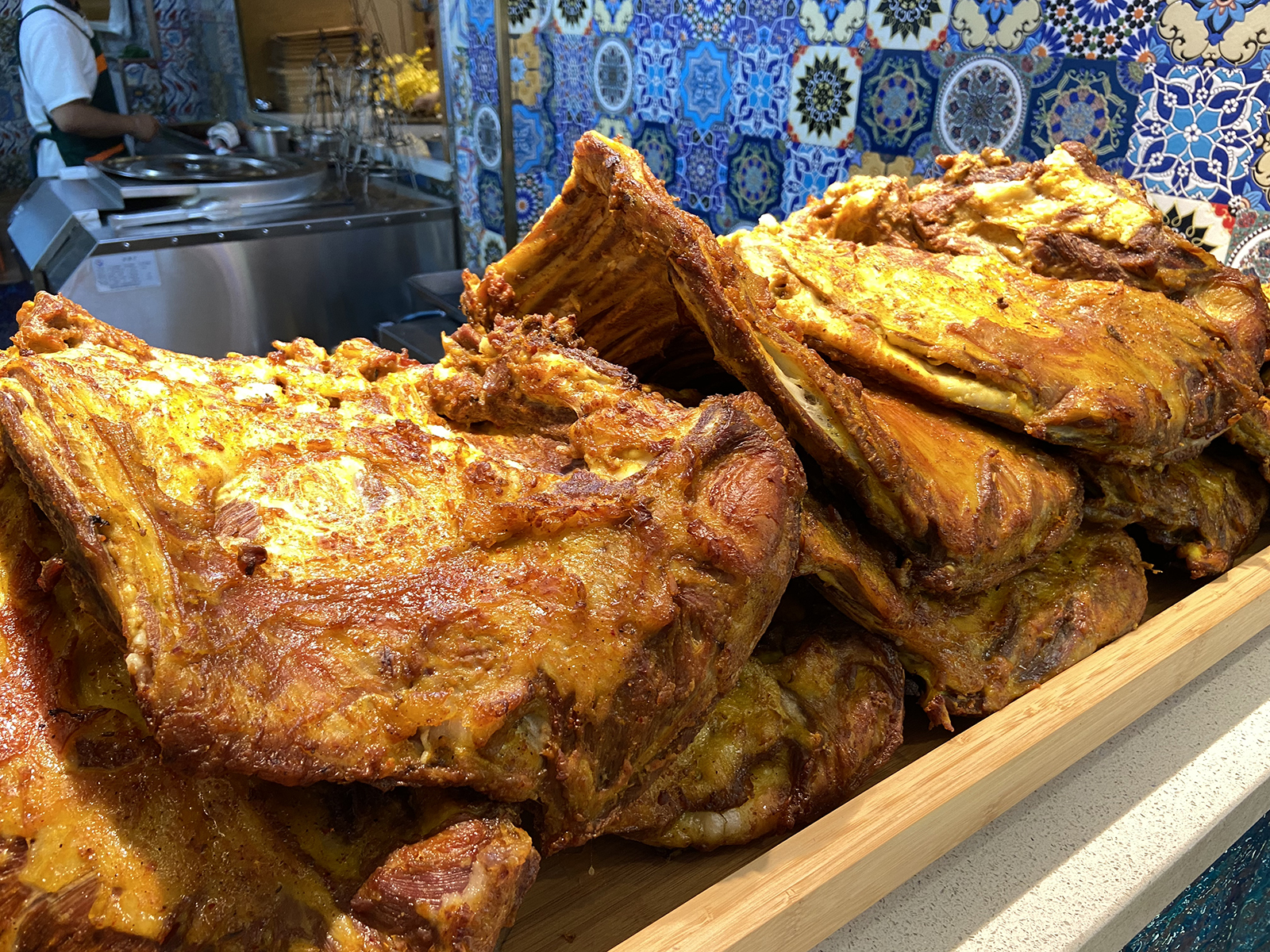 Roast lamb chops are displayed at a restaurant in Xinjiang. /CGTN