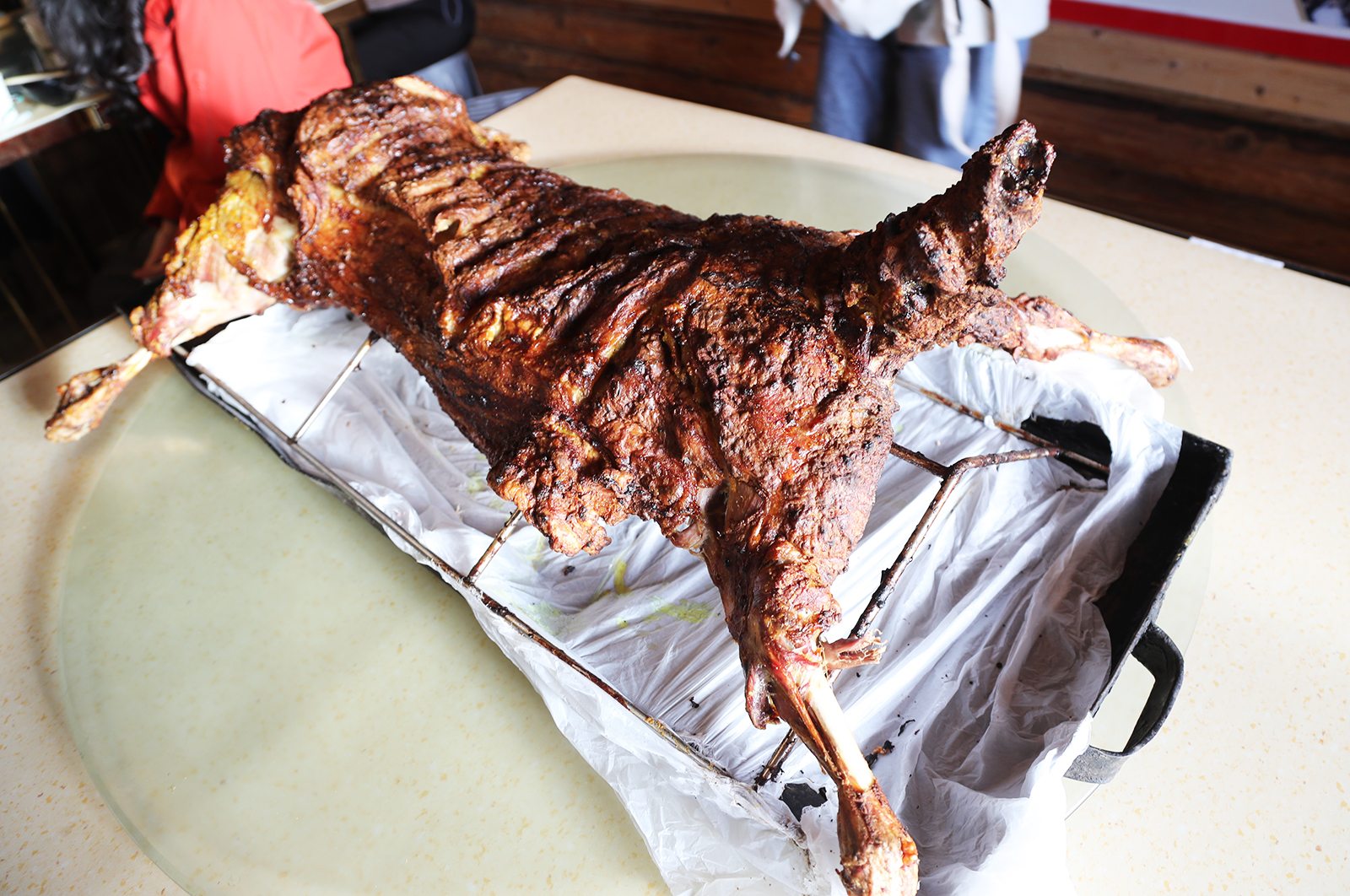 A whole roast lamb is served in Xinjiang. /CGTN