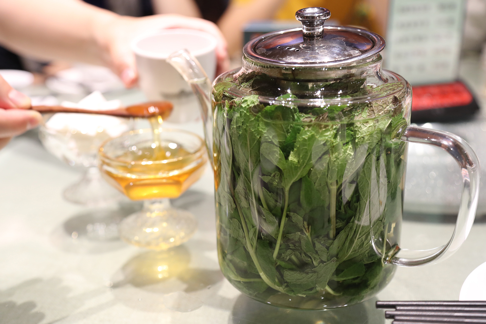 Mint tea is served with sugar or honey in Xinjiang. /CGTN