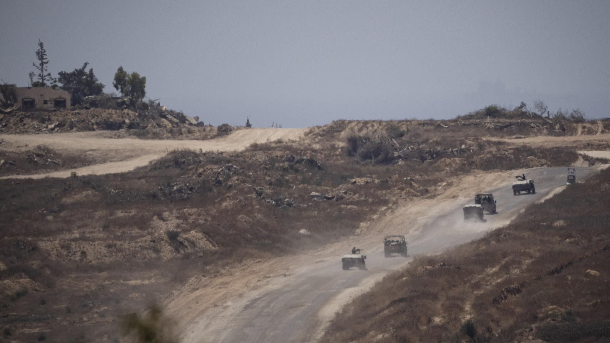 Israeli soldiers move near the Israeli-Gaza border as seen from southern Israel, June 10, 2024. /CFP