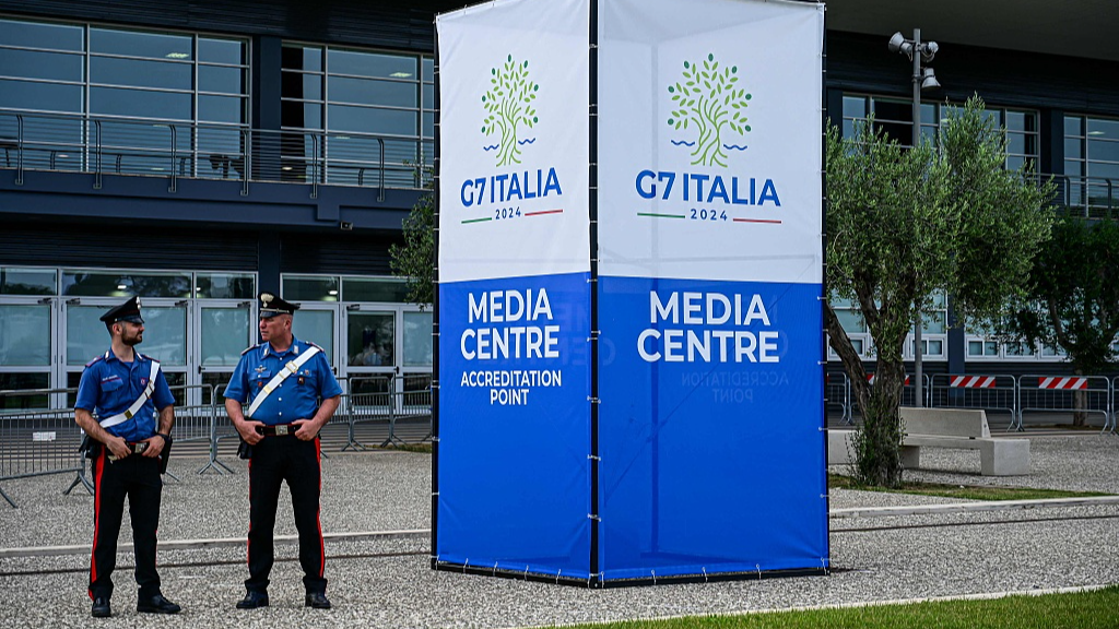 Police officers stand outside the G7 Italy 2024 media center in Bari, Italy, June 11, 2024. /CFP