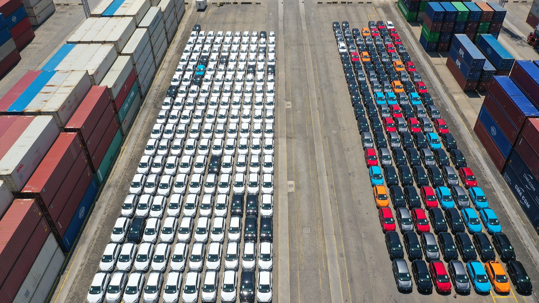 Over 2,700 EVs are loaded onto a container ship in Xiamen City, with the ship set to make stops at ports in the UK and Belgium before reaching Germany, southeast China's Fujian Province, July 8, 2023. /CFP