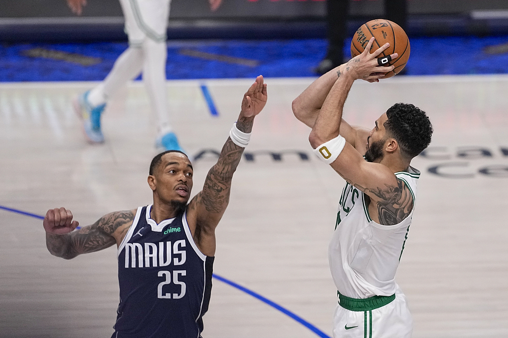 Jayson Tatum (R) of the Boston Celtics shoots in Game 3 of the NBA Finals against the Dallas Mavericks at the American Airlines Center in Dallas, Texas, June 12, 2024. /CFP