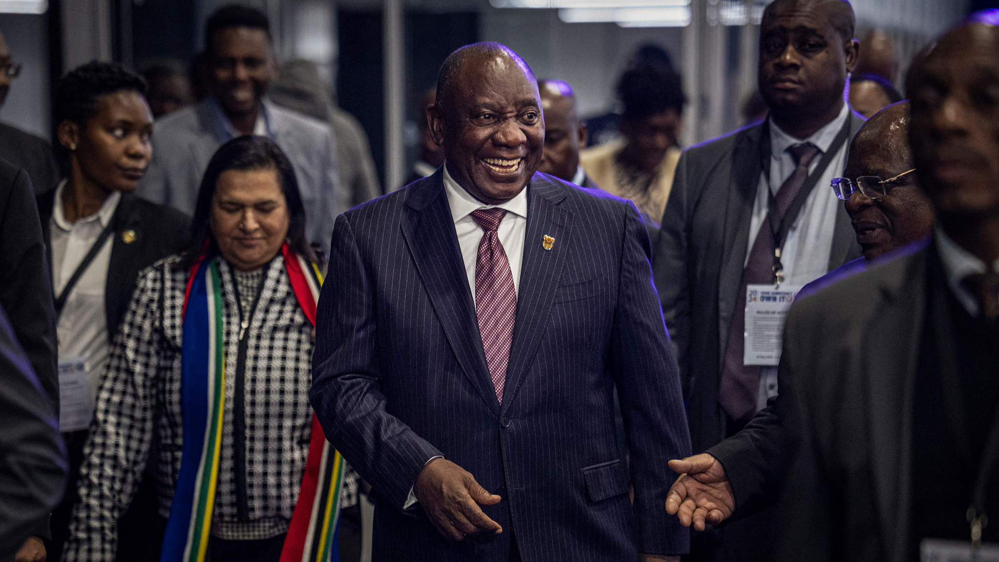 South African President and President of the African National Congress (ANC) Cyril Ramaphosa (C) leaves after the official announcement of the South African general election results in the Independent Electoral Commission (IEC) National Results Center at the Gallagher Convention Centre in Midrand, on June 2, 2024. /CFP