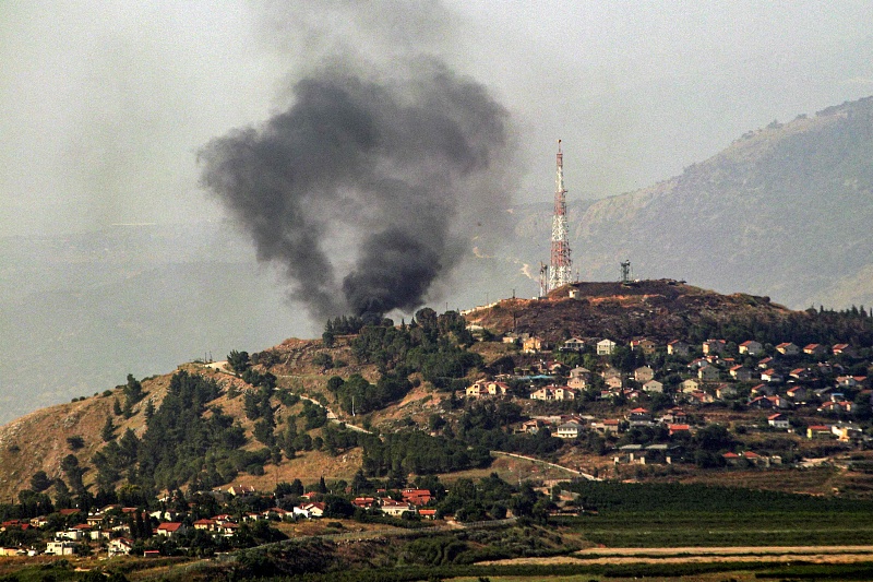 A photo taken from the southern Lebanese border town of Marjayoun shows smoke billowing from Metullah on the Israeli side after being targeted by rockets from Lebanon, June 14, 2024. /CFP
