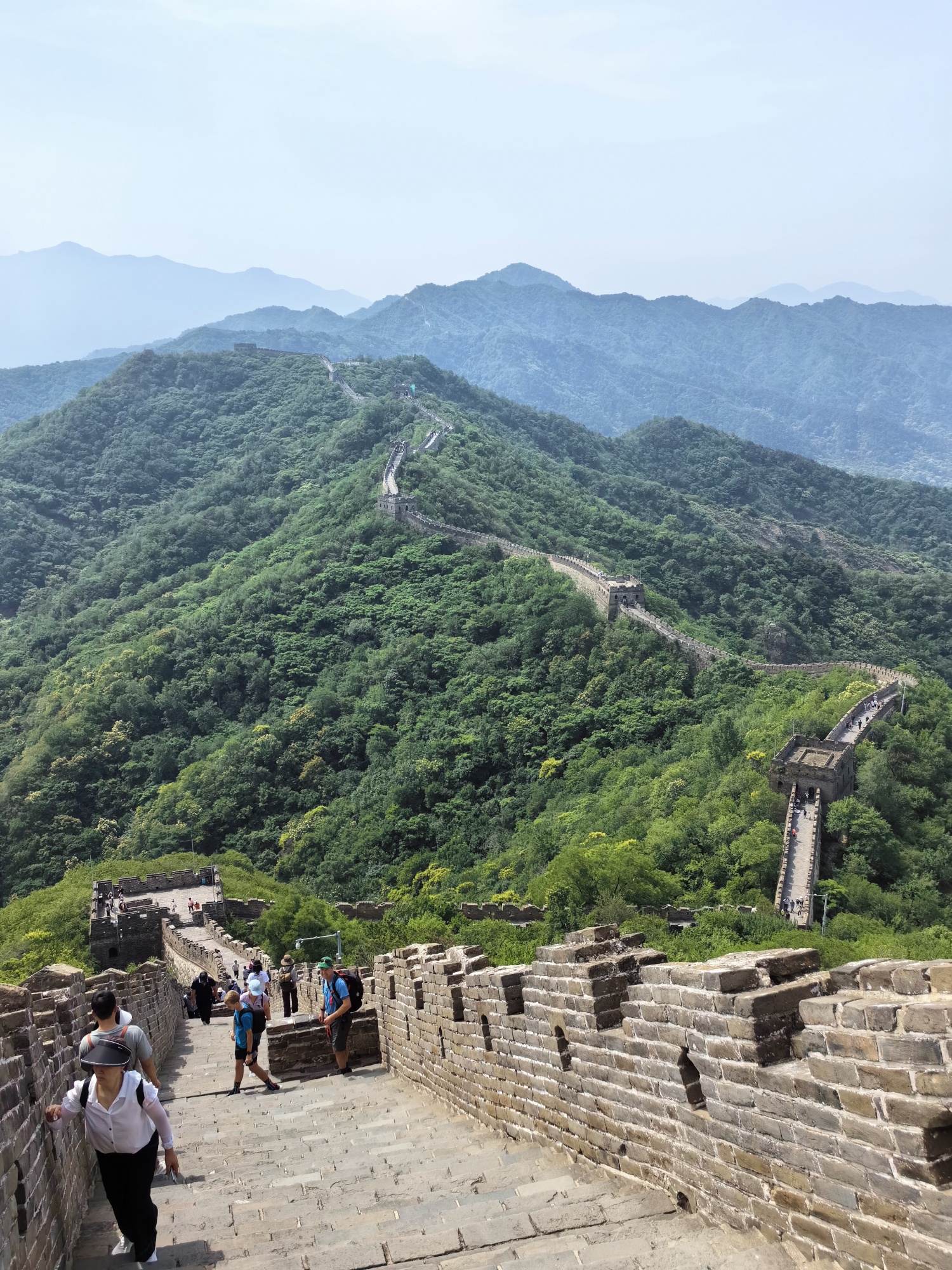 Tourists visit the Mutianyu section of the Great Wall in Beijing on June 10, 2024. /CGTN