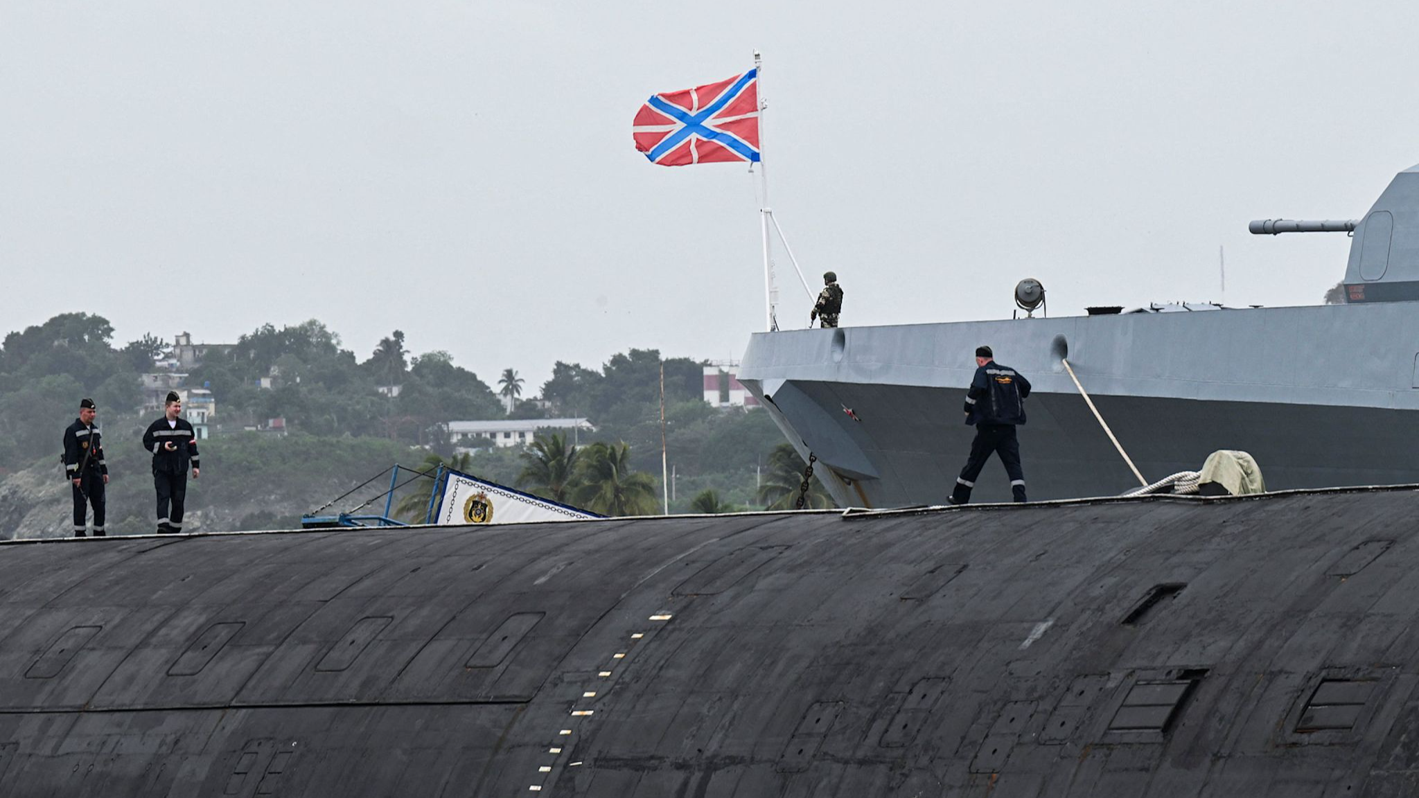 Russian Marines stand on top of the Russian nuclear-powered submarine Kazan, part of the Russian naval detachment visiting Cuba, in Havana's harbor on June 14, 2024. /CFP