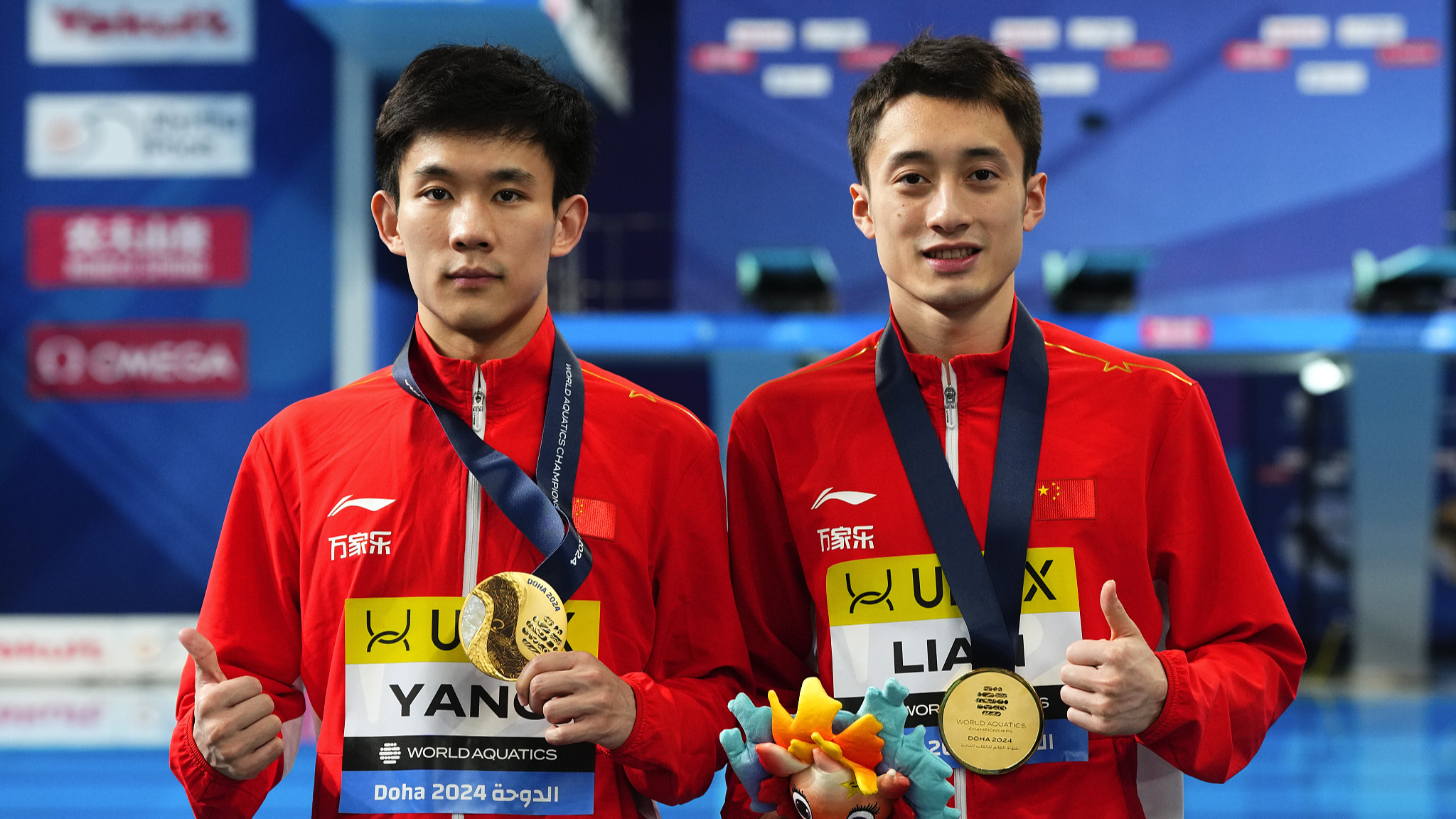 A file photo of Yang Hao (L) and Lian Junjie winning the men's 10m synchronized platform at the 2024 World Aquatics Championships in Doha, Qatar, February 8, 2024. /CFP