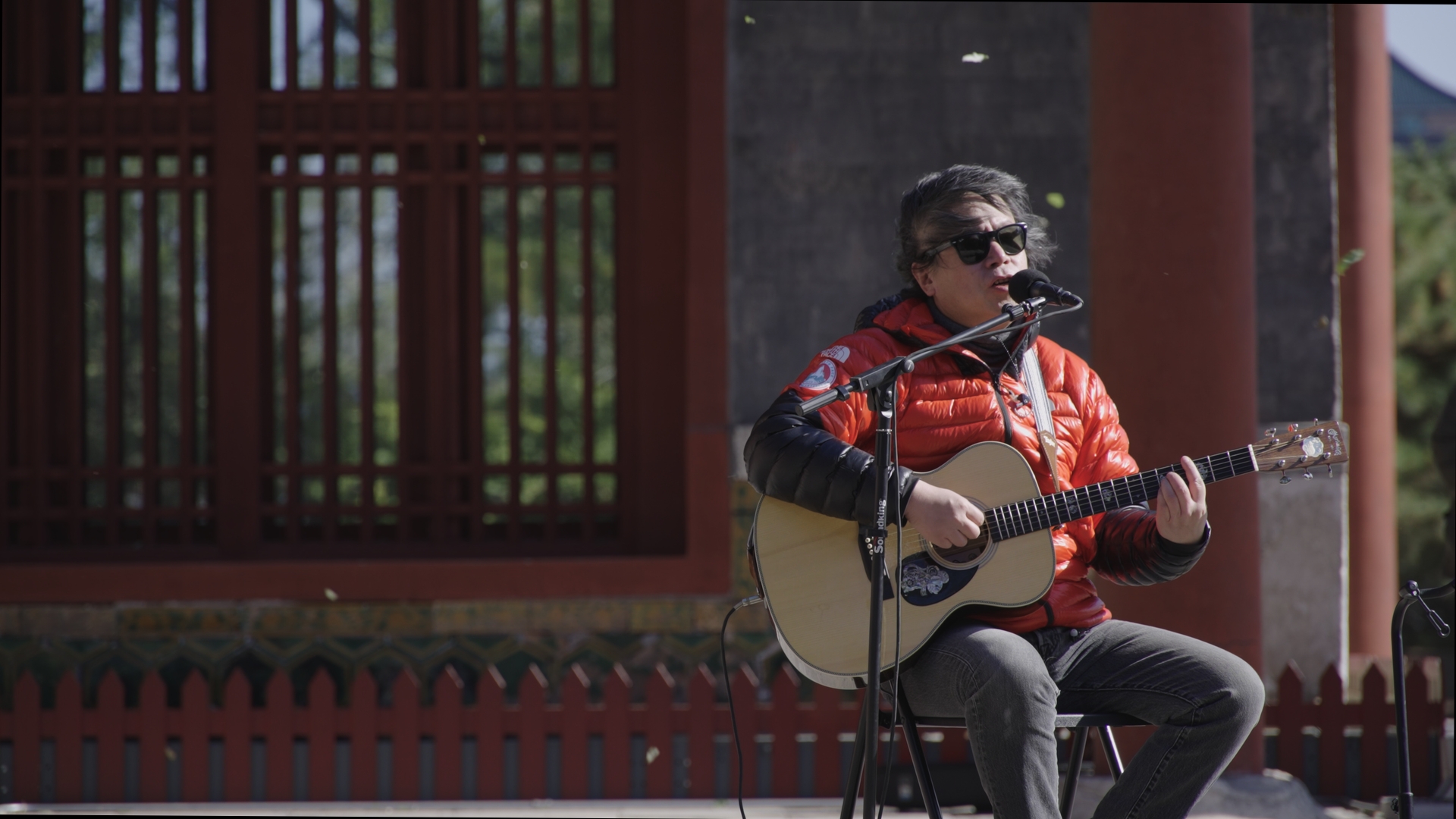 Blind musician and composer Zhou Yunpeng performs at the Pudu Temple in Beijing, November 6, 2023. /Timeless Acoustics within the Ancient Walls