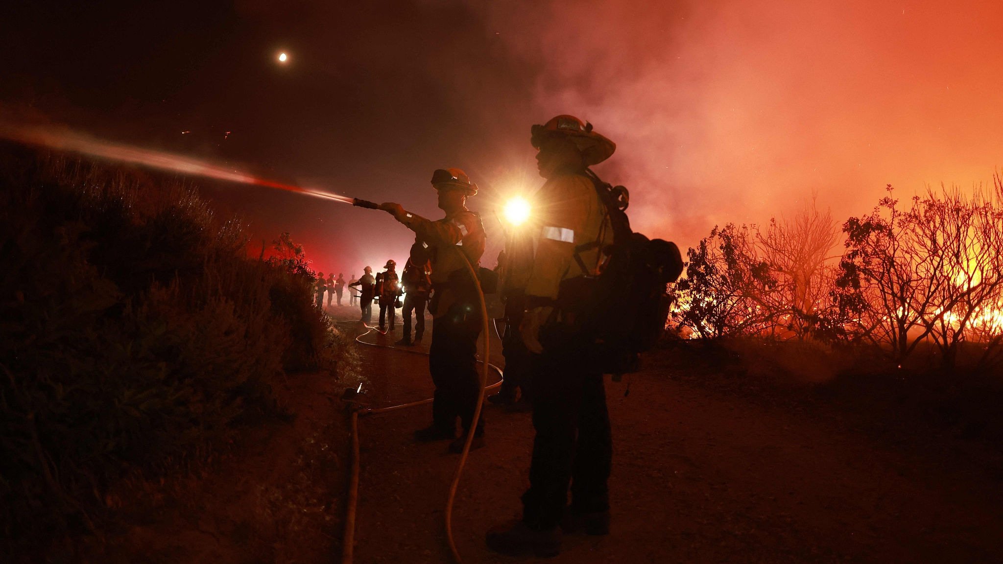 Firefighters respond to the Post Fire as it burns in Hungry Valley recreation area, California, June 16, 2024. /CFP