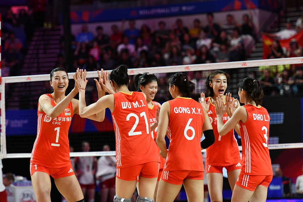Chinese players celebrate their victory over Poland during the FIVB Women's Nations League stop in Hong Kong, China, June 16, 2024. /CFP