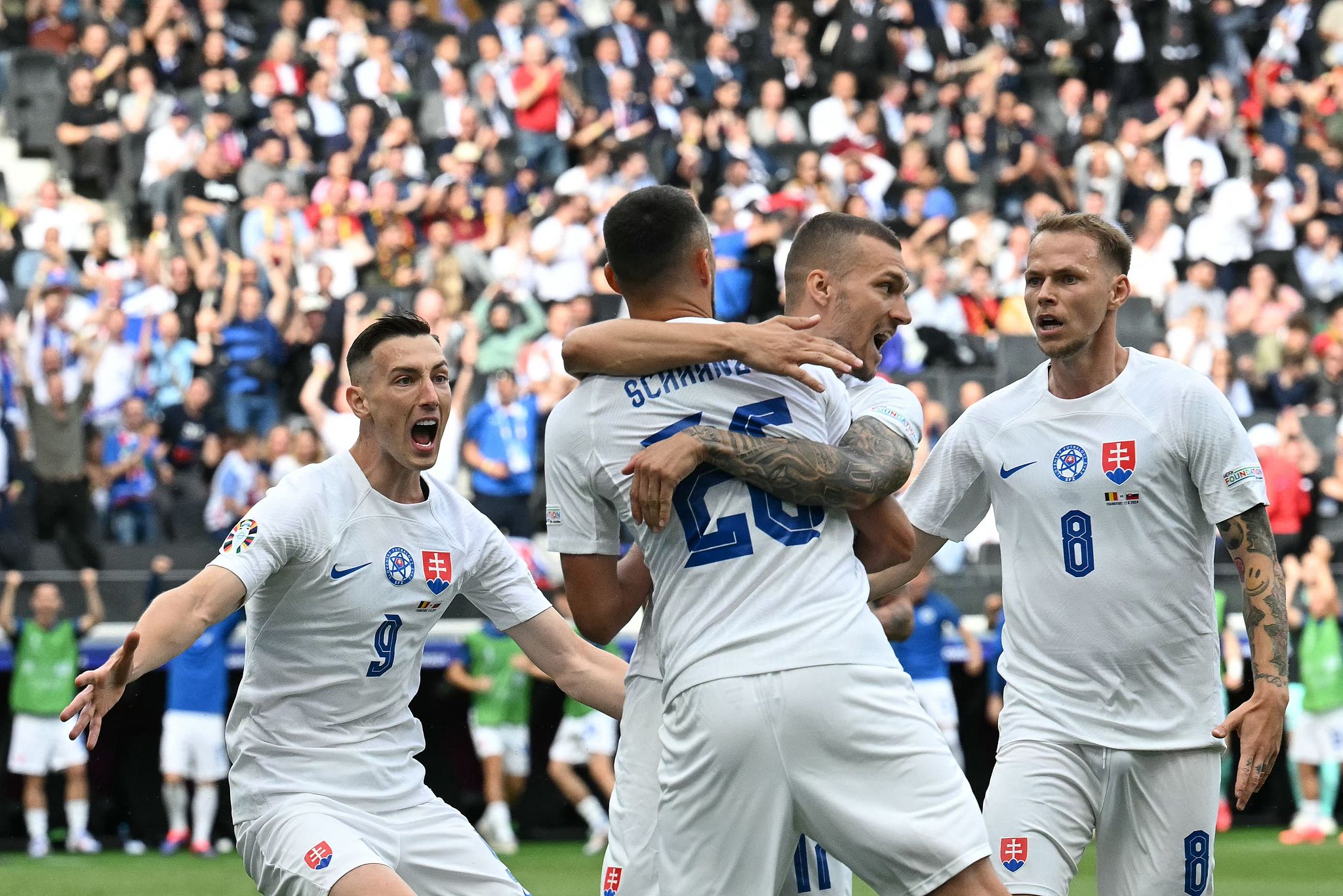 Slovakia's players celebrate after the team scored a goal in the UEFA European Championship group game against Belgium at the Frankfurt Arena in Frankfurt, Germany, June 17, 2024. /CFP