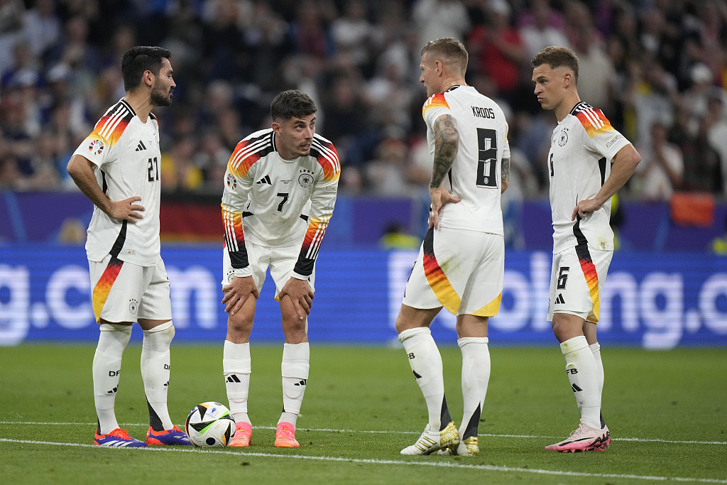 German players talk to each other in the UEFA European Championship group game against Scotland in Munich, Germany, June 14, 2024. /CFP