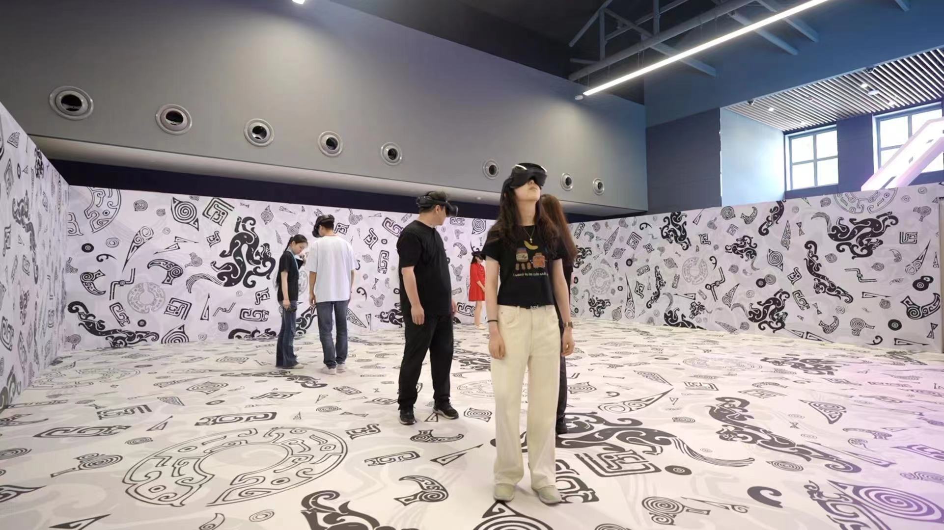 Visitors experience extended reality devices in Shanghai on June 17, 2024. /CGTN