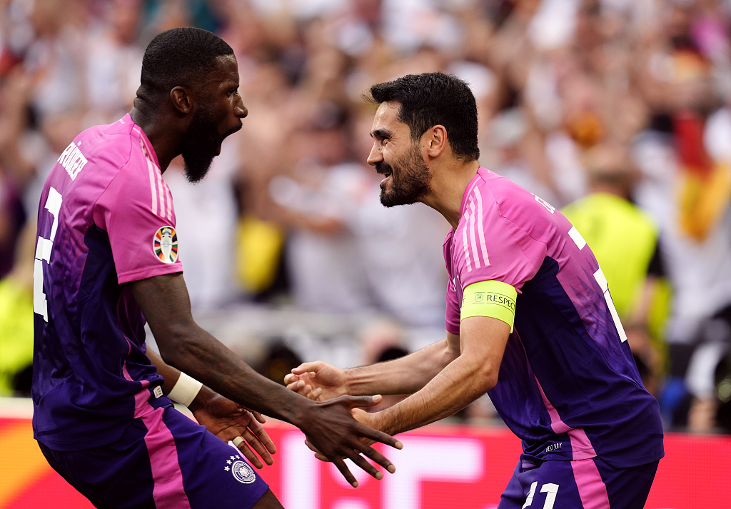 Germany's Ilkay Gundogan (R) celebrates scoring their side's second goal of the game with teammate Antonio Rudiger during the UEFA Euro 2024 Group A match at the Stuttgart Arena in Stuttgart, Germany, June 19, 2024. /CFP 