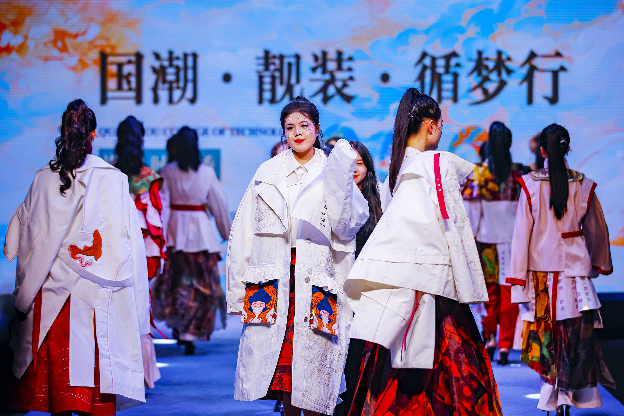 Models display garments at a fashion show showcasing students' graduation projects at Quanzhou College of Technology in Fujian Province on June 18, 2024. /CFP