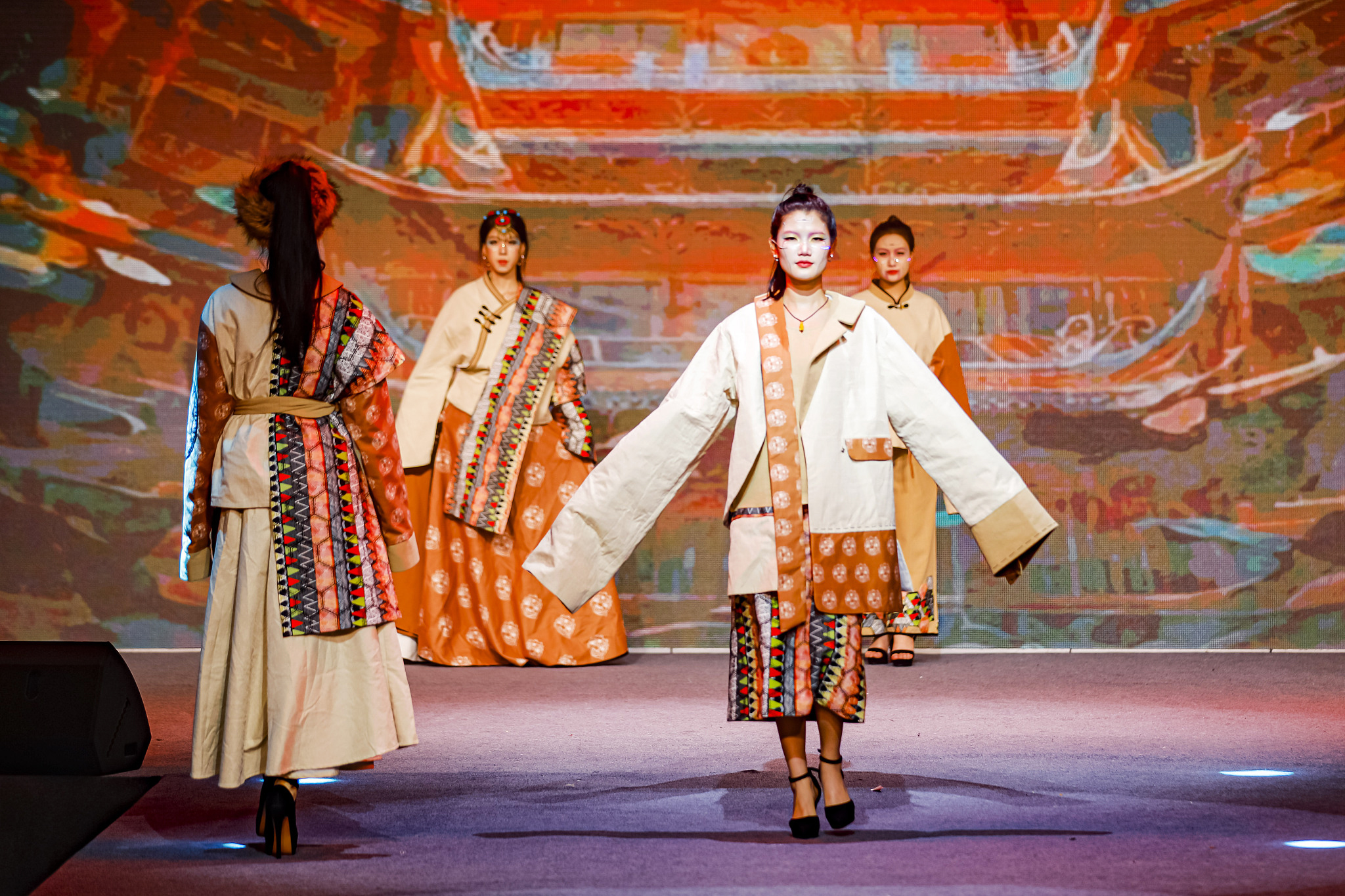 Models display garments at a fashion show showcasing students' graduation projects at Quanzhou College of Technology in Fujian Province on June 18, 2024. /CFP