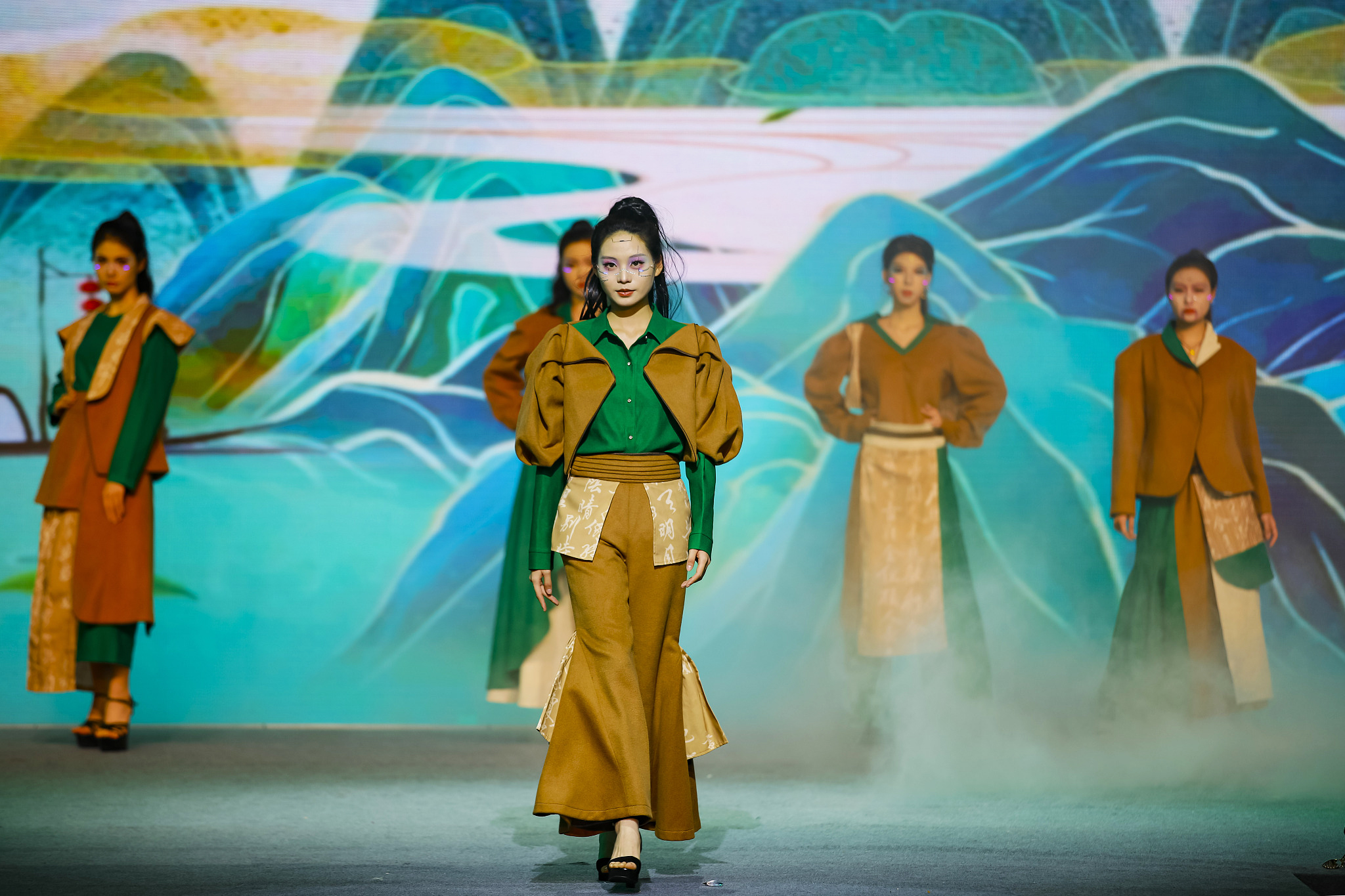 Models display garments at a fashion show showcasing students' graduation projects at Quanzhou College of Technology in Fujian Province on June 18, 2024. /CFP