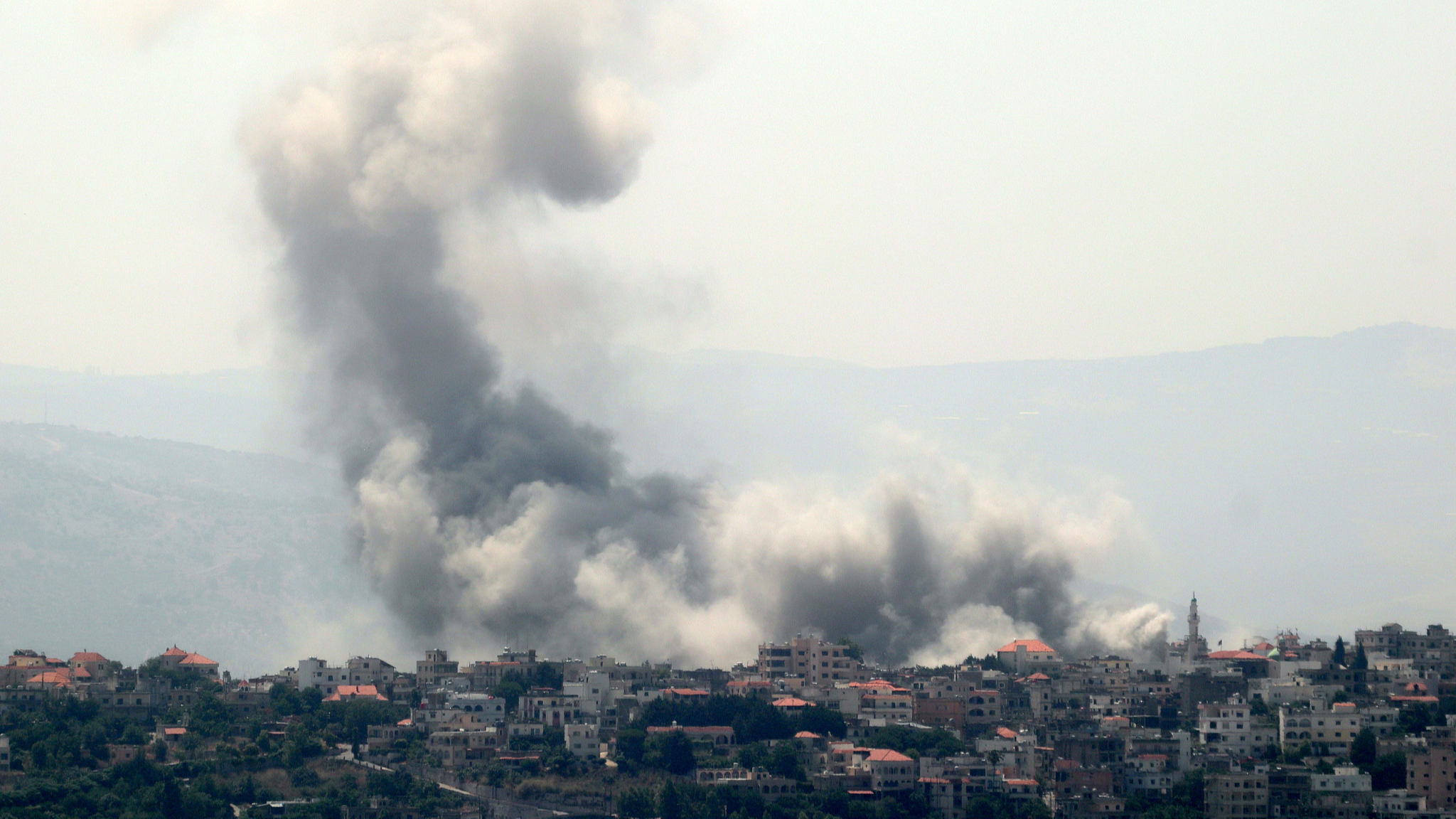 Smoke rises after an Israeli airstrike hits Hiyam, Lebanon, June 19, 2024. /CFP