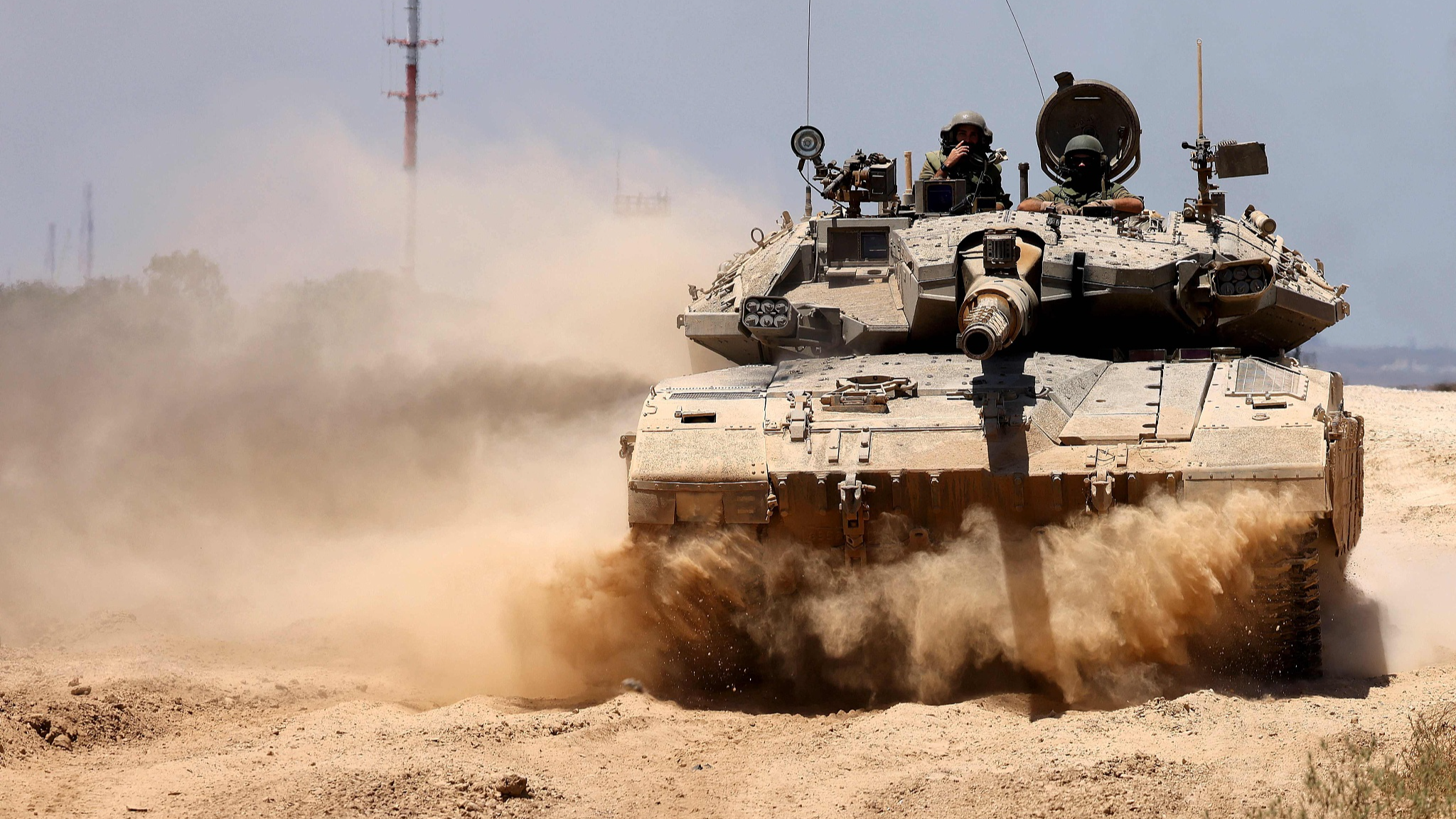 An Israeli tank patrols along the country's southern border with the Gaza Strip, June 18, 2024. /CFP