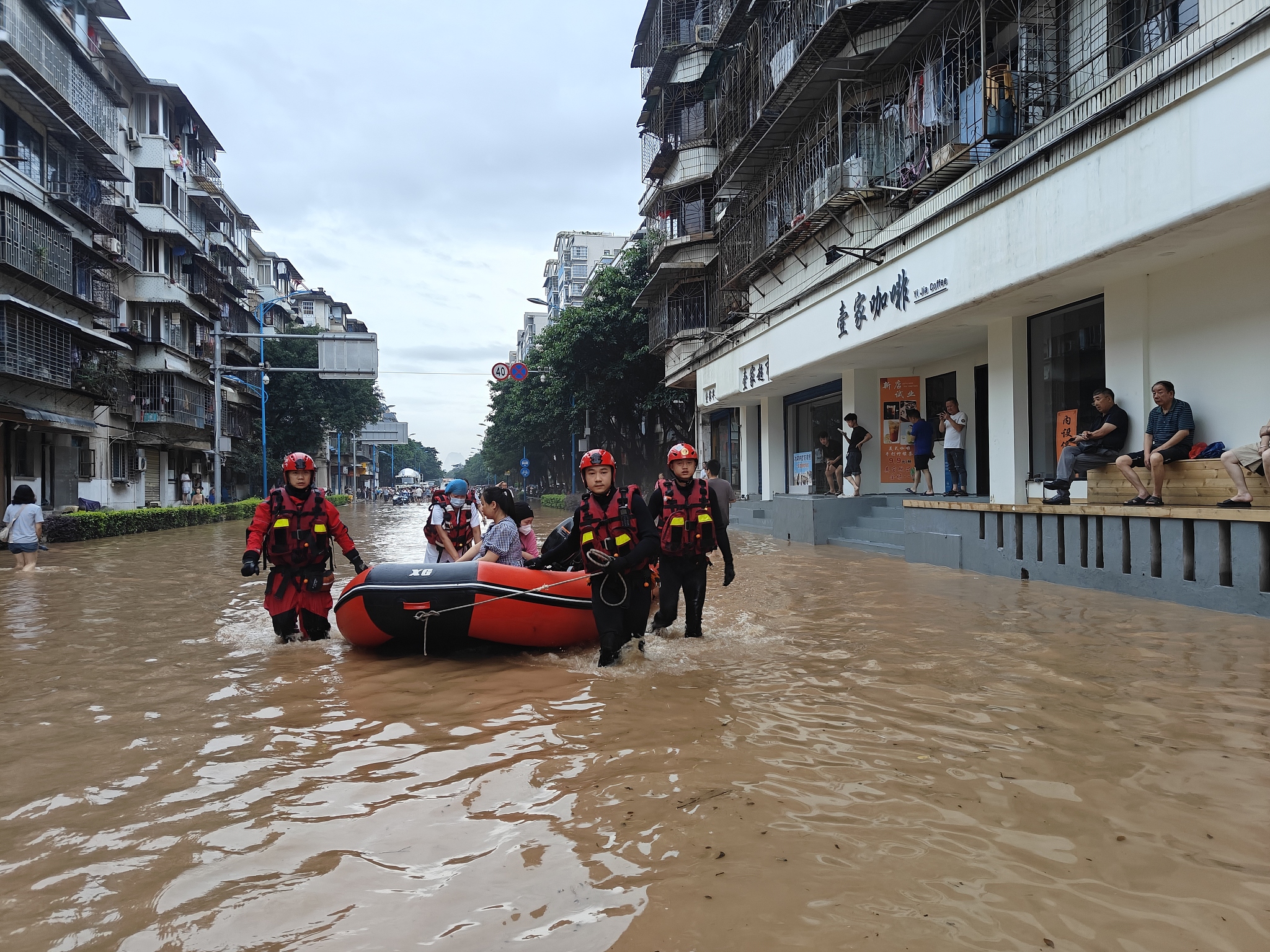 Stranded people due to the flood are evacuated in Guilin City, south China's Guangxi Zhuang Autonomous Region, June 19, 2024. /CFP