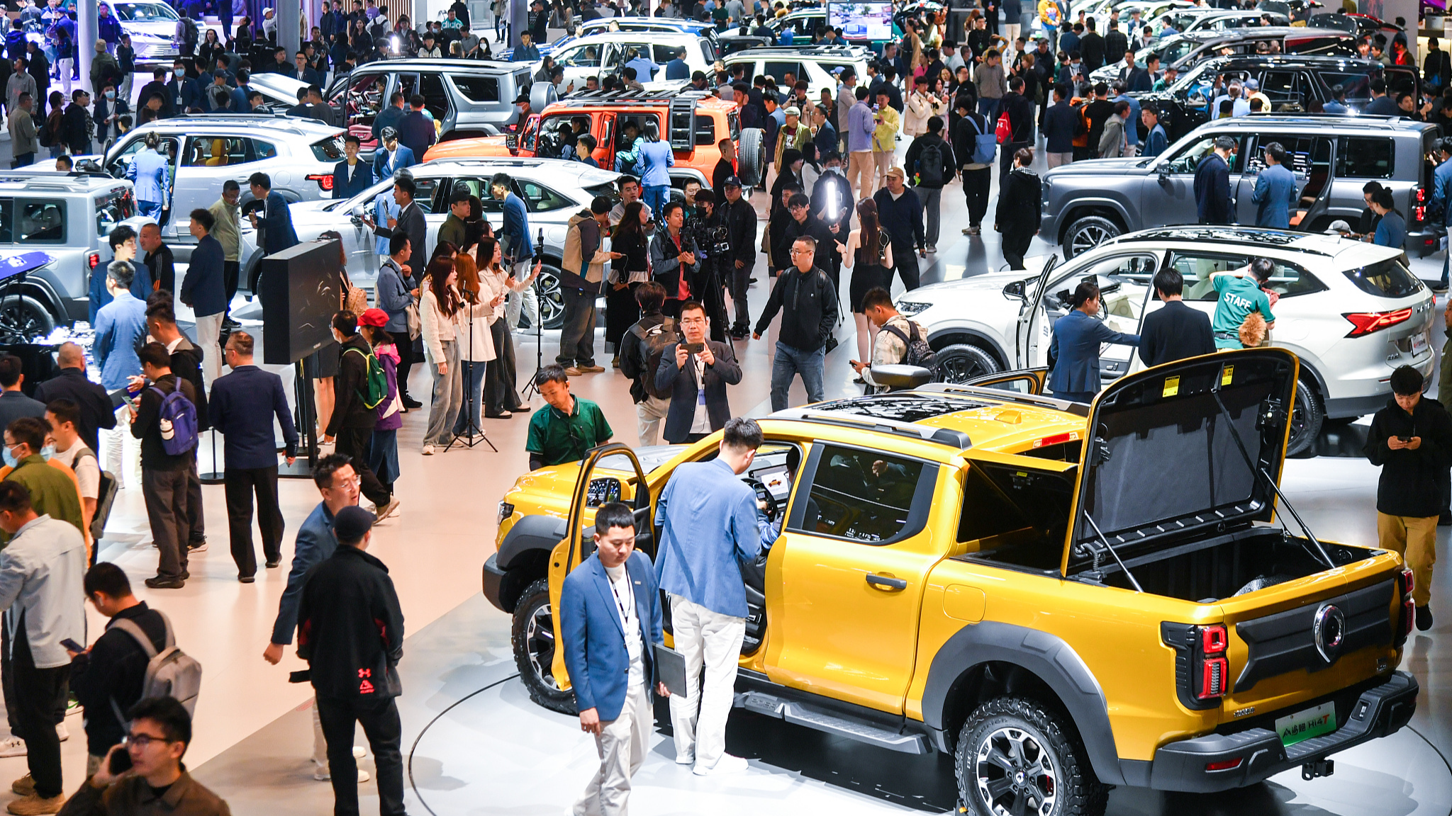 Visitors check out new energy vehicles at the 2024 Beijing International Automotive Exhibition, Beijing, China, April 29, 2024. /CFP