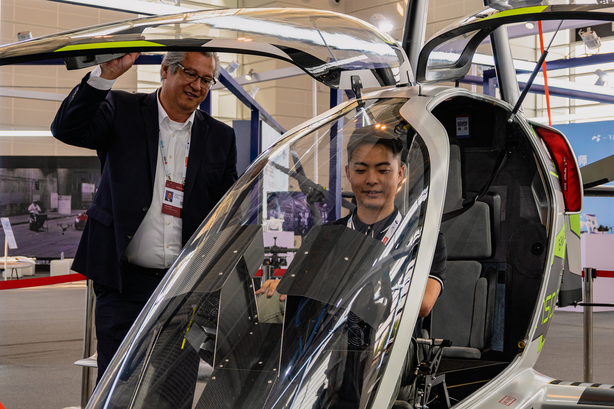 A visitor learns about a low-altitude aircraft at the World Intelligence Expo 2024 in north China's Tianjin Municipality, June 20, 2024. /CFP