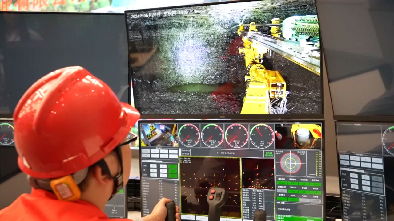 A worker remotely controls a rock drill, Shuangkouping Phosphate Mine, central China's Hubei Province, June 20, 2024. /CMG