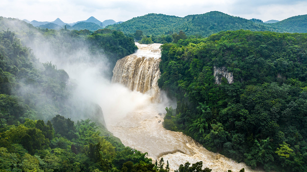 Huangguoshu Waterfall is seen gushing at peak flow in Anshun, Guizhou Province on June 20, 2024. /CFP