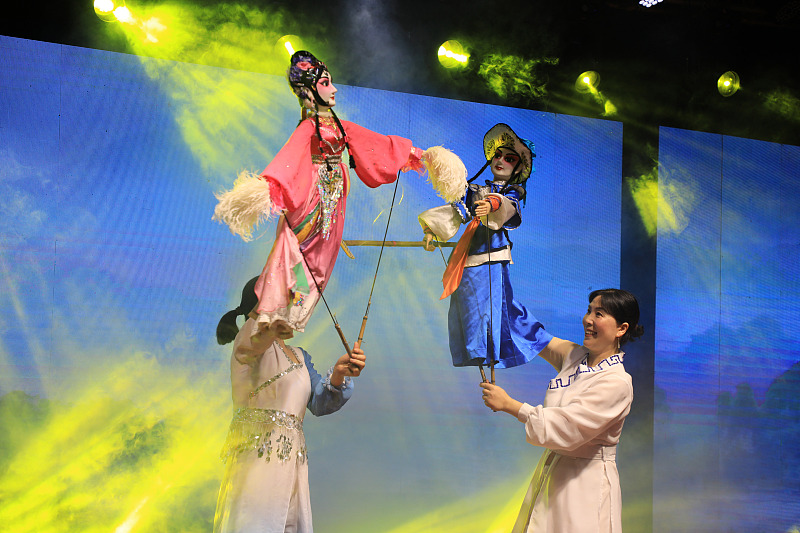 A puppet show is performed at a village gala in Shaoyang City, Hunan Province, June 22, 2024. /CFP