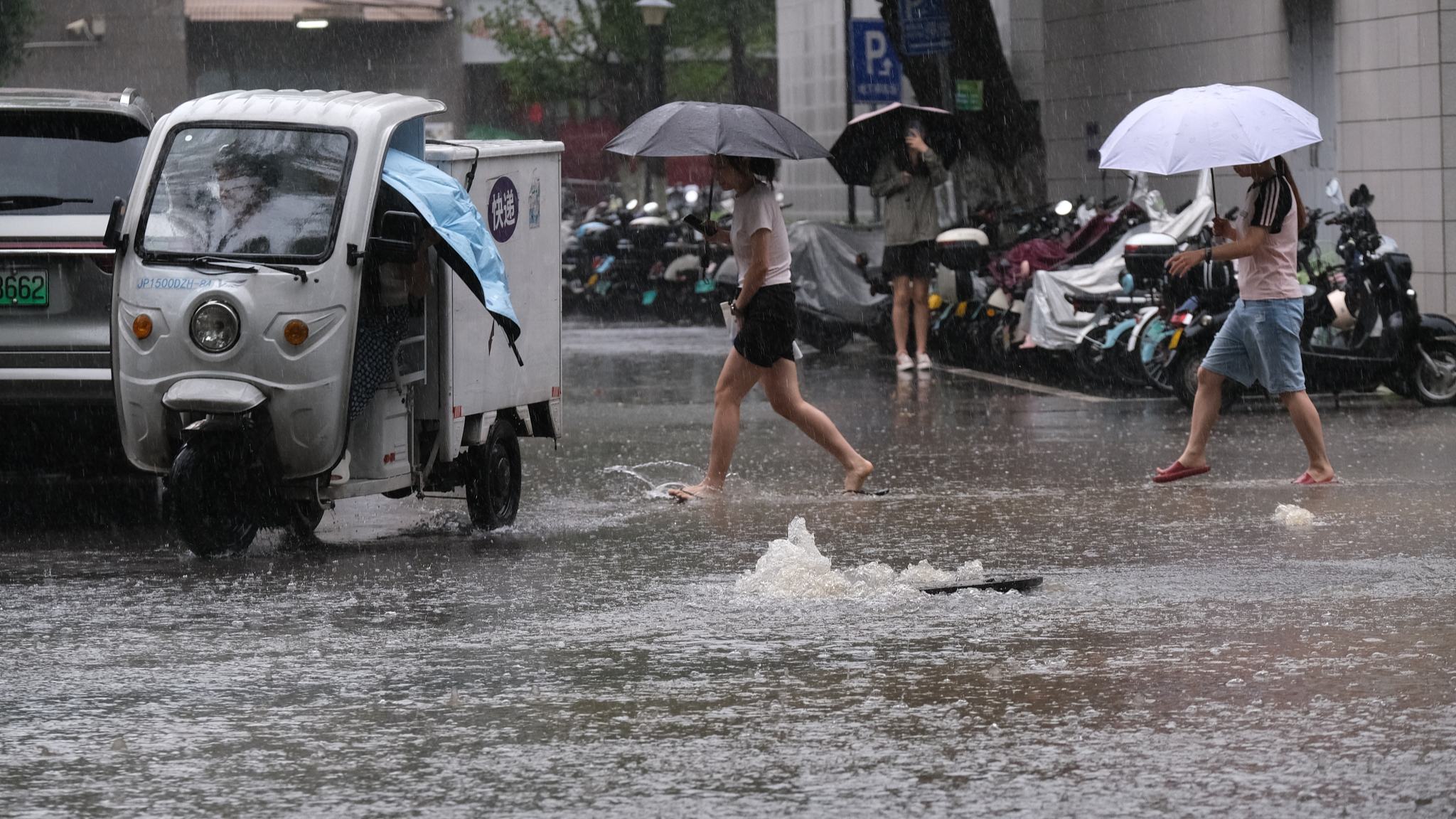 Water come out of the sewer in Changsha, capital of central China's Hunan Province, June 24, 2024. /CFP