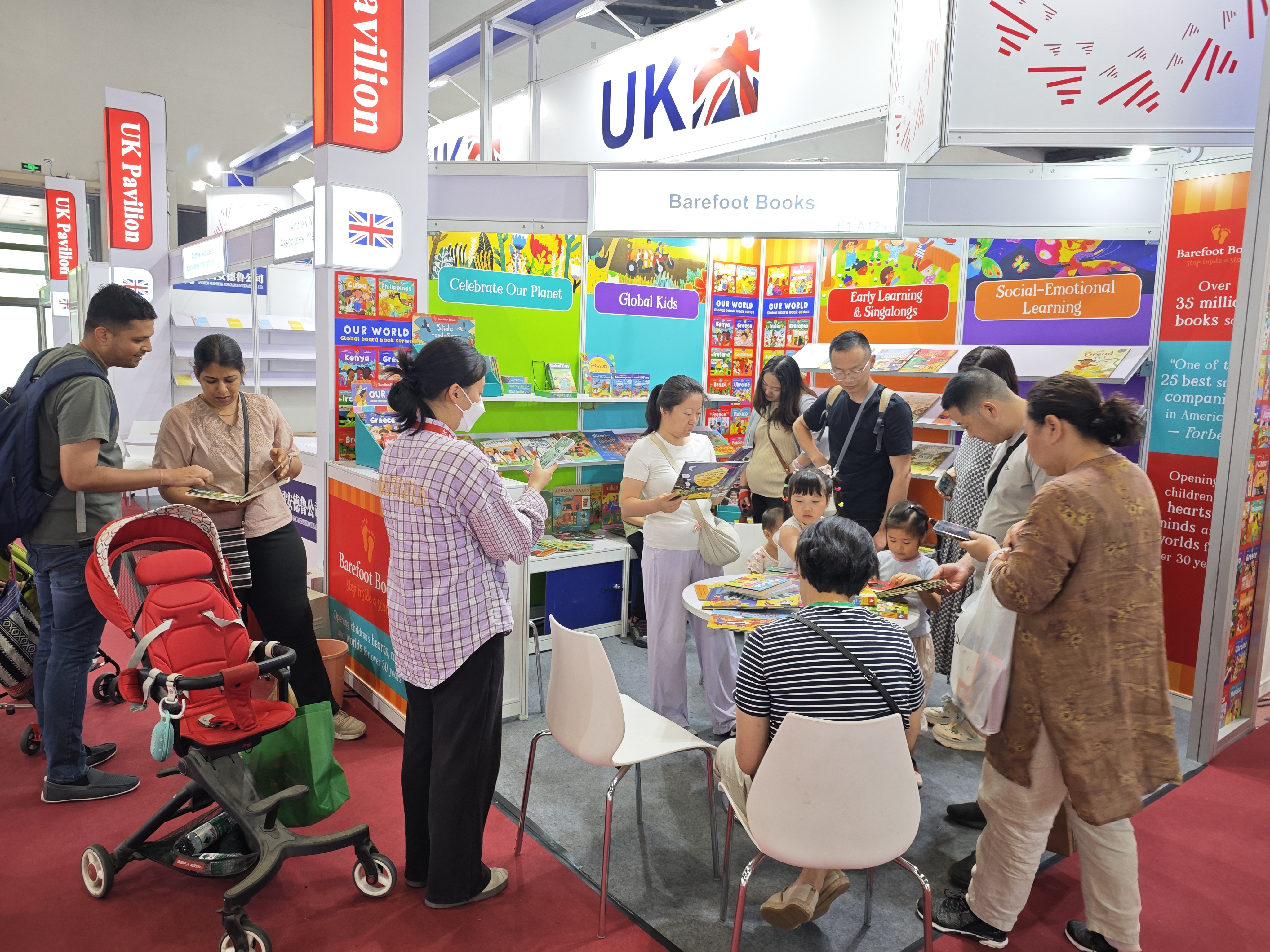 Visitors read books at the UK pavilion at the the 30th Beijing International Book Fair, June 23, 2024. /CFP