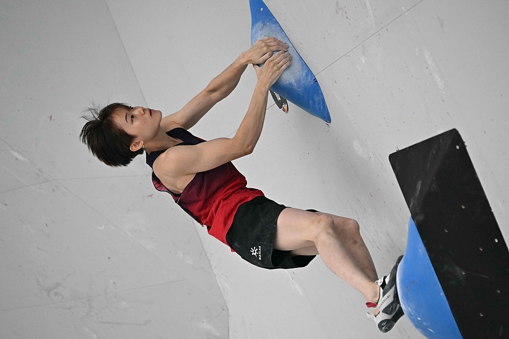 Luo Zhilu of China competes in the sport climbing women's combined event at the 2024 Olympic Qualifier Series in Budapest, Hungary, June 23, 2024. /CFP