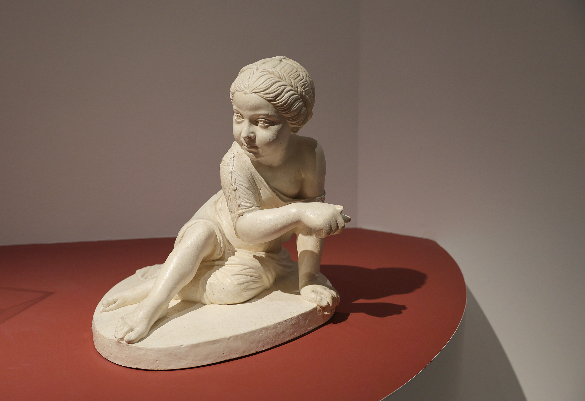 This photo taken on June 22, 2024, shows a statue of a crouching girl from the Roman Empire. /CFP