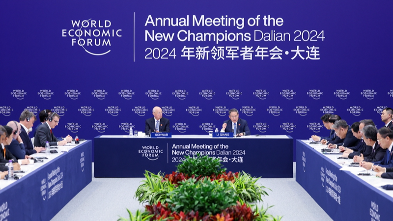 Chinese Premier Li Qiang attends a symposium for foreign business representatives at the 15th Annual Meeting of the New Champions, also known as the Summer Davos, in Dalian, northeast China's Liaoning Province, June 25, 2024. /Xinhua